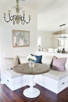 a white couch and table in a room