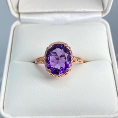 Rose Gold Oval Amethyst Ring With Center Stone, Classic Rose Gold Amethyst Ring With Prong Setting, Oval Amethyst Ring In Rose Gold, Classic Rose Gold Amethyst Rings, Oval Rose Gold Amethyst Ring, Gold Amethyst Jewelry With Filigree, Amethyst Filigree Ring Gift, Gold Amethyst Jewelry With Filigree Detail, Antique Amethyst Ring With Filigree