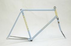 a blue and yellow bicycle frame on a white background