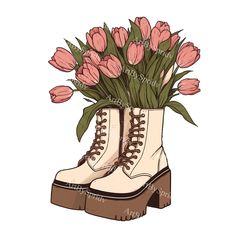 a pair of white boots with pink flowers in them