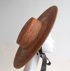 'Bentley'  Hat. A smart and uncluttered classic warm straw colour hat perfect for Autumn, with a flat crown and handfinished flat steel wired brim. Appropriate wear for all of your most important dressy occasions, casual or formal 'Bentley' Hat is a stylish compliment to any outfit. Inspired by nautical history.     SHIPPING All shipments will be sent via DHL All Worldwide parcels will arrive within 2-3 working days. Due to the custom made/made to order nature of our products they will always be Fiercely Feminine, Boat Hat, Straw Boater Hat, White Cliffs, Oxford Shoes Outfit, Straw Boater, Couture Hats, Outfit Inspired, Classic Hats