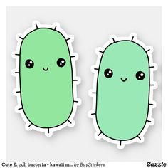 two green cactus stickers with eyes on them