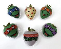 teenage mutant cupcakes are arranged in the shape of strawberries