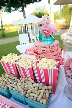 a table topped with lots of food and candy