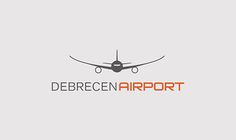 the logo for debrecen airport, an airliner that has landed on land