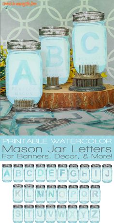 three mason jars are sitting on top of a wooden block with letters and numbers in them