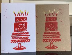 two greeting cards with red and white designs on them, one has a birthday cake