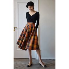 Scottish Style Plaid Skirt For Fall, Scottish Plaid Skirt For Fall, Fall Scottish Plaid Skirt, Fitted Retro Orange Skirt, Retro Plaid Flared Skirt, Orange Long Skirt For Fall, Scottish Red Skirt For Fall, Orange Skirt For Fall, Orange Fall Skirt