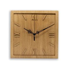 a square wooden clock with roman numerals