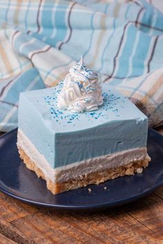 a piece of cake sitting on top of a blue plate