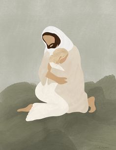 a woman sitting on the ground holding a baby in her arms and wearing a white shawl