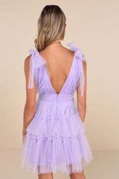 Devising a plan to look fabulous and enchanting will surely be easy with a dress like the Lulus Tulle-Proof Lavender Tulle Beaded Tie-Shoulder Tiered Mini Dress! Sheer mesh tulle, adorned with shiny beaded details throughout, shapes this eye-catching dress that features a deep V-neck (and back) and wide straps that tie at the shoulders. A high, banded waist tops a fluffy, tiered mini skirt with extra layers of tulle to create volume and a twirl-worthy look! Hidden back zipper/clasp. Fit: This ga Lavender Tulle Dress, Tulle Mini Dress, Tiered Mini Skirt, Tie Dress, Wide Straps, Tulle Dress, Aesthetic Clothes, Shoulder Dress, Lavender