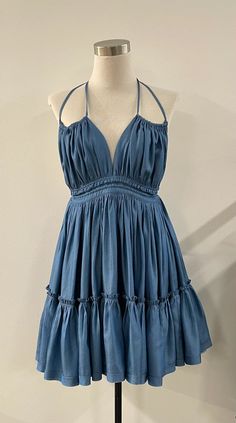 This cute dress ties on the shoulders and at the back for a sexy style. Makes it the perfect date night or special occasion dress. - Halter dress with double straps in 100% Tencel. - Adjustable in the back- Flowy- Ruffles- Ties at nape and lower back- Open back- Tiered tent skirt- High waist The Perfect Date, Perfect Date Night, Special Occasion Dress, Perfect Date, Cute Dress, Tie Dress, Lower Back, Special Occasion Dresses, Model Measurements