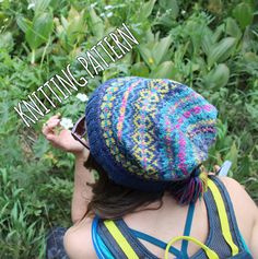 a woman wearing a knitted hat with flowers in the background and text overlay that reads knitting pattern