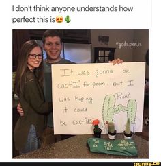 a man and woman standing next to each other holding a sign that says i don't think anyone understands how perfect this is