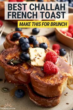 french toast on a plate with berries and blueberries next to it is the title best challah french toast make this for brunch