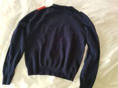 "Vintage sweater. Made by The Gleneagles Range. Made in Scotland. Red, white, and navy colors. Geometric pattern. Long sleeves. Crew neck. Ribbed waist. Gender neutral. Pullover style. 100% pure new wool. (measurements taken flat) Label size: no size label (estimate between small-medium) Bust: 19.5\" Waist: 17.5\" Length: 21\" Shoulder width: 16\" Sleeve length: 23.5\" Excellent vintage condition. No rips, holes, or stains. Will need to be lint-rolled." Navy Crew Neck Polo Sweater For Winter, Vintage Navy Sweater With Long Sleeves, Navy Vintage Long Sleeve Sweater, Vintage Tapestry, Vintage Sweater, Size Label, Navy Color, Vintage Sweaters, Black Belt