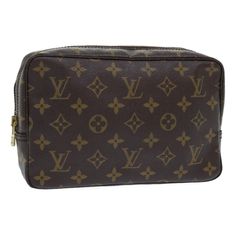 Elevate your style with the iconic Louis Vuitton Trousse Toilette 23 Clutch Bag. Crafted from LV's signature monogram canvas, this piece exudes luxury and sophistication. The compact size makes it perfect for carrying essentials while adding a touch of elegance to any outfit.Featuring a spacious interior and a secure zip closure, this versatile clutch is ideal for both day and evening wear. The timeless design and impeccable craftsmanship of this LV piece ensure a timeless addition to your acces Lv Vanity Bag, Lv Toiletry Bag, Louis Vuitton Trousse Make Up Bag, Louis Vuitton Toiletry Pouch 26, Louis Vuitton Vanity Case, Prada Crossbody Bag, Vuitton Bag, Burberry Bag, Body Bag