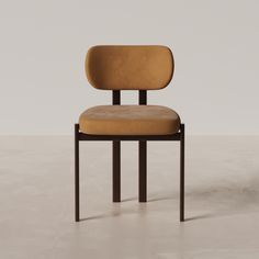 a brown chair with a tan seat and back rest on a white floor in front of a gray wall