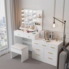 a bedroom with a desk, chair and mirror on the wall next to a window