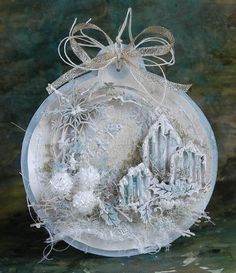 a glass ornament with snowflakes on it