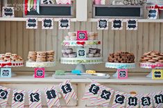 an assortment of desserts on display at a birthday party