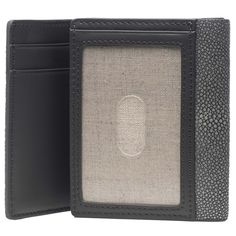 Feast your eyes on Evan. This slick men’s tri-fold is crafted with genuine leather throughout. The outside is a beautiful showcase of genuine shagreen and the interior is trimmed with smooth Napa leather. The wallet’s inside is home to pockets that are perfect for holding credit cards and more, with a traditional wider pocket for holding bills. Evan has a photo ID window on the inside as well that is kissed with linen lining and is finished with a plastic overlay protector. This handsome wallet, Designer Trifold Wallet For Formal Occasions, Designer Leather Trifold Wallet With Card Slots, Formal Trifold Wallet With Id Window, Designer Trifold Wallet With Coin Pocket, Business Leather Trifold Wallet With Id Window, Formal Leather Card Holder With Id Window, Luxury Trifold Card Holder With Rfid Blocking, Leather Card Holder With Id Window For Formal Use, Leather Trifold Wallet With Id Window