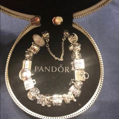 Bracelet 7.1 Include 19 Charms Box Cupcake, Girl,M, Gift Box,Pandora Bag,Giraffe,Love,Baby Carrier,Gift,Elephant,Dollar Bag,Luggage,Coffee Mug,Love Envelope,Buddha, Jewelry Box,Pink Mirando Charm, 1 Clo, 1 Spacer I Took It To Pandora Store Appraisal For $875 Luxury Charm Bracelet - Perfect Gift, Luxury Charm Bracelet For Gift, Luxury Charm Bracelet As Gift, Luxury Silver Jewelry For Birthday Gift, Elegant Silver Charm Bracelet For Gifting, Luxury White Gold Charm Bracelet Gift, Luxury Silver Jewelry In Gift Box, Silver Jewelry In Original Box For Anniversary, Elegant White Bracelet For Birthday Gift