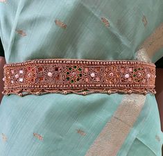 "Beautiful maggam work indian ethnicwear waist belt (vaddanam) for Adults Excellent accessory for girls/women Indian wear (Saree, half-saree or dresses) for parties, weddings and events. Looks very pretty and attractive. This fabric waist belt is a perfect match on Wedding Sarees & Lehanga Cloth Vadanam Vaddanam Vadanalu Vadanallu Ottyanam Kardhani Kamarbandh For ladies Suitable to wear on Saree, Half-saree, nice frocks or long frocks or Lehenga's or Pattu Langa or Langa Voni or western dresses This embroidery Saree belt can be a perfect gift for your Girl Friend daughter mother sister fiancée bride. This can be a good gift or return gift for any girl/women for wedding , pooja, house warming or any event. This can be a perfect gift to your mother, sister, wife or a friend. This Heavy Aari Women Indian Wear, Indian Wear Saree, Belt Saree, Saree Belt, Hip Belts, Pattu Langa, Langa Voni, Saree With Belt, Work Belt