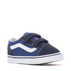 Keep your kids' look classic in the Vans Old Skool V toddlers' sneakers. Originating from the popular Old Skool, the Old Skool V features the same infamous sidestripe, suede uppers, and padded collars. These skate shoes go the long haul no matter what your day has in store. Two hook and loop straps for secure fit. Sturdy canvas and suede uppers. Re-enforced toecaps to withstand wear and tear. Midsole cushioning for all-day comfort. Padded collars for support and flexibility. Signature Vans waffl Vans Low-top Sneakers For School, Sporty Vans Sneakers For School, Sporty School Sneakers By Vans, Vintage Indigo, Long Haul, Vans Old Skool, Side Stripe, Old Skool, Hook And Loop