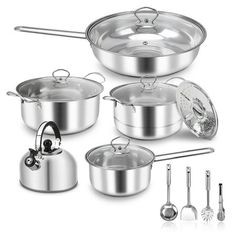 an assortment of pots and pans on a white background