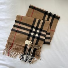 Nwt Burberry Ekd (Equestrian Knight Design) Classic Check Cashmere Scarf W/ Multicolored Knight. Base Color: Camel. 100% Cashmere. Never Worn. Size: 168x30cm. Butberry Scarf, Luxury Brown Winter Scarves, Luxury Classic Plaid Scarves, Luxury Plaid Wool Scarves, Burberry Scarves & Shawls, Burberry Scarf, Burberry Vintage, Burberry Accessories, Vintage Burberry