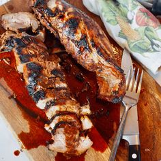 the meal is prepared and ready to be eaten on the wooden table with utensils