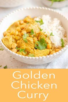 the golden chicken curry is served in a white bowl with rice and cilantro