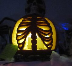 a lit up skeleton in the shape of a human rib cage