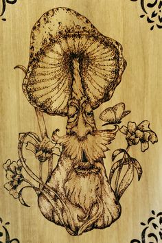 a wooden plaque with an image of a mushroom and lily of the valley on it