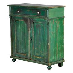 an old green cabinet with two doors and one drawer on the bottom, against a white background