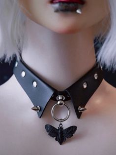 Embrace the edgy elegance with our Black Moth Pendant Choker.  This striking accessory features a unique fake collar design, adorned with intricate black moth details that exude a dark, mysterious charm.  Perfectly blending sweet and punk aesthetics, the choker is embellished with studded accents, making it a standout piece for any alternative fashion enthusiast. Punk Aesthetics, Moth Pendant, Steampunk Fashion Female, Dark Mysterious, Red Gothic, Edgy Elegance, Steampunk Fashion Male, Gothic Chokers, Fake Collar