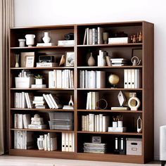 a bookshelf filled with lots of books in a living room