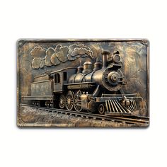 a metal plaque with a steam engine train on it