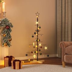 a decorated christmas tree in the corner of a living room