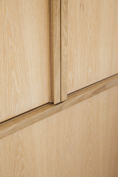 a close up view of some wood cabinets