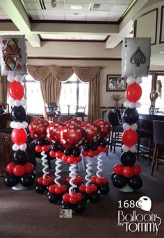 balloons are arranged in the shape of a crab on top of a table at a party