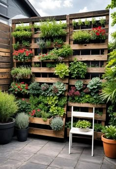 a wooden pallet filled with lots of plants