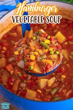 a spoon full of vegetable soup with the title overlay reads, hamburger vegetable soup