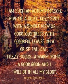 an autumn poem written in green and orange on a path surrounded by trees with yellow leaves