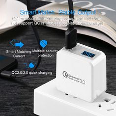 the smart charger is plugged in to an external power outlet for charging devices