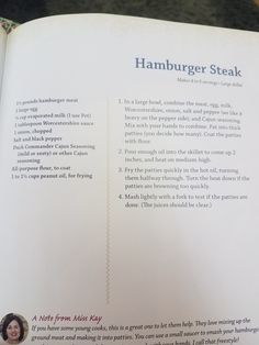 an open book with the words hamburger steak written in red and blue on it's page