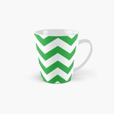 a green and white zigzag pattern tall mug