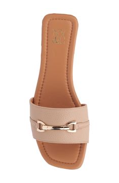 A gleaming horse-bit buckles adds an elegant detail to a slim-soled slide sandal. Synthetic upper and lining/rubber sole Imported Spring Open Toe Slides With Gold Buckle, Open Toe Slides With Gold Buckle For Spring, Spring Slides With Gold Buckle And Open Toe, Elegant Mules With Buckle Closure In Slide Style, Elegant Slide Mules With Buckle Closure, Elegant Open Toe Slides With Buckle Closure, Chic Slide Mules With Buckle Closure, Elegant Flat Slides With Textured Footbed, Flat Sandals With Tang Buckle